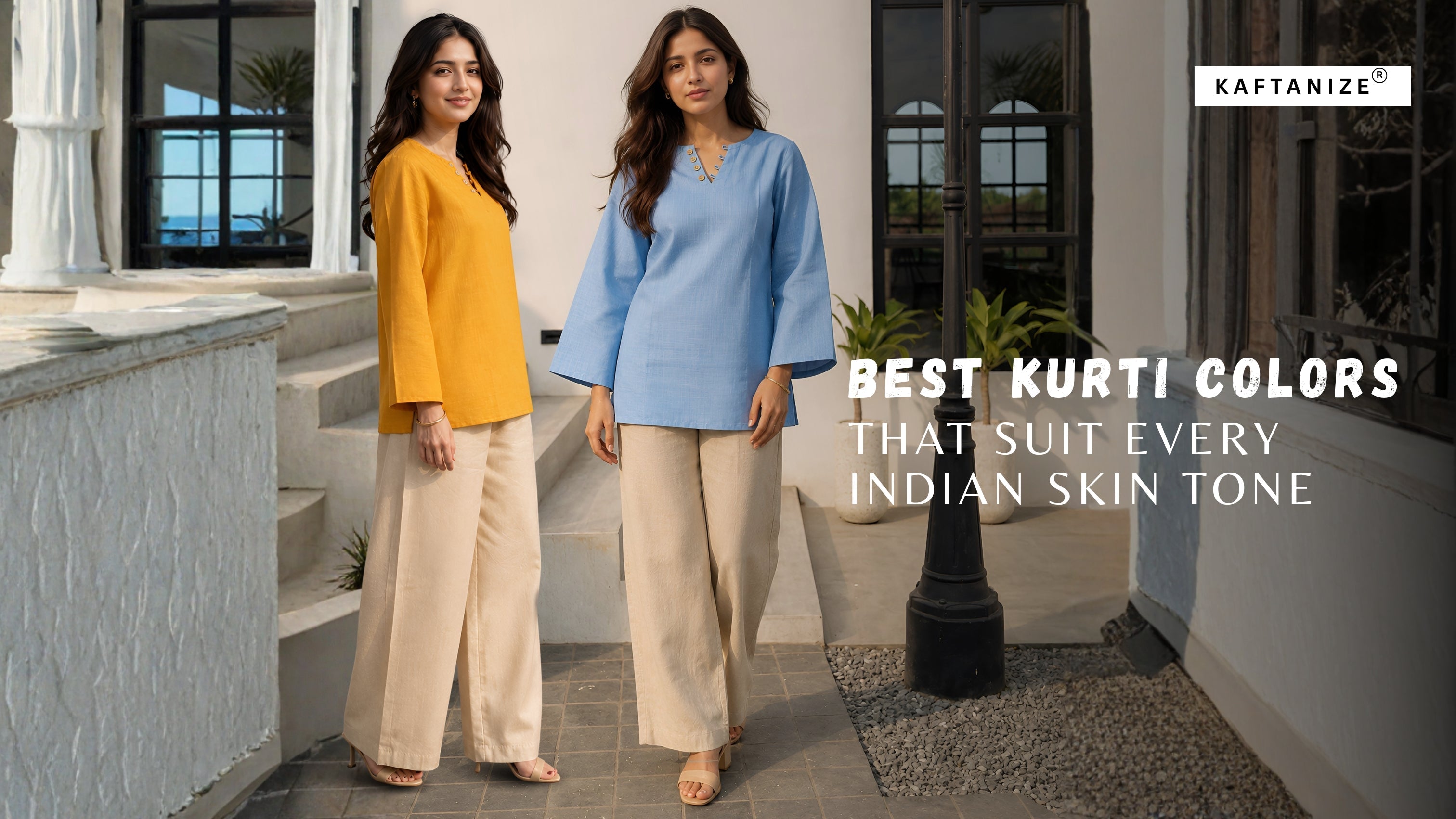 Dusky skin model wearing a royal blue embroidered cotton kurti