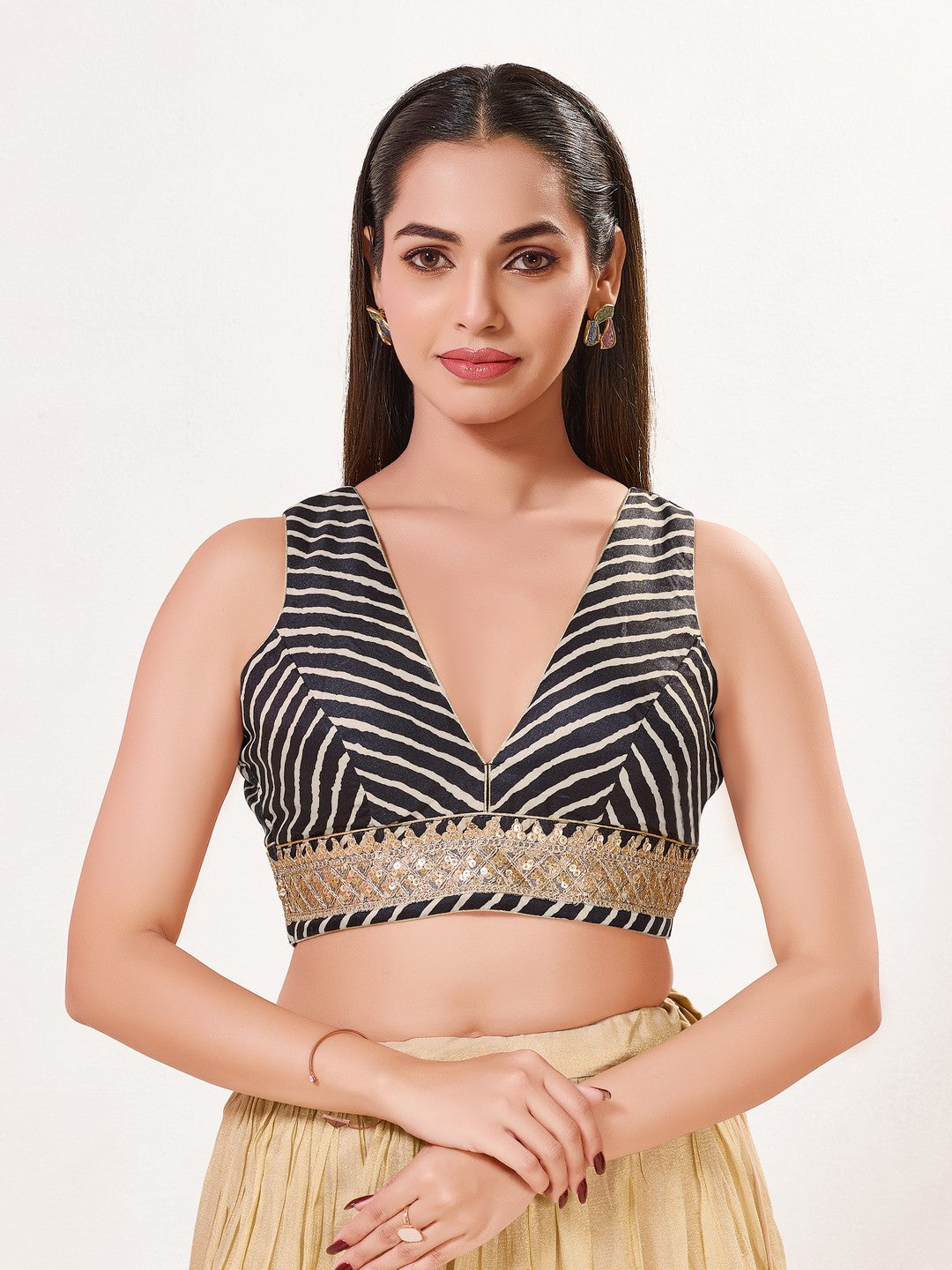 Laherya Printed Plunging V Neckline Sleeveless Blouse