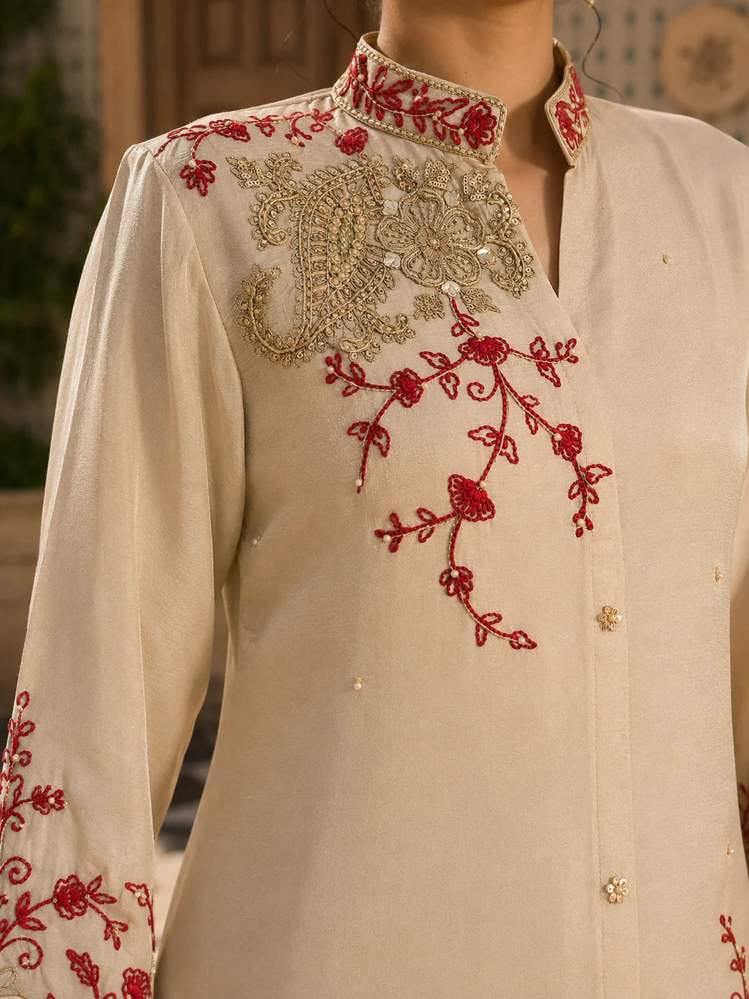 Beige Kurta Set with Red and Gold Floral Embroidery in Chinnon