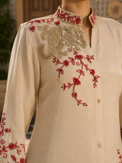 Beige Kurta Set with Red and Gold Floral Embroidery in Chinnon