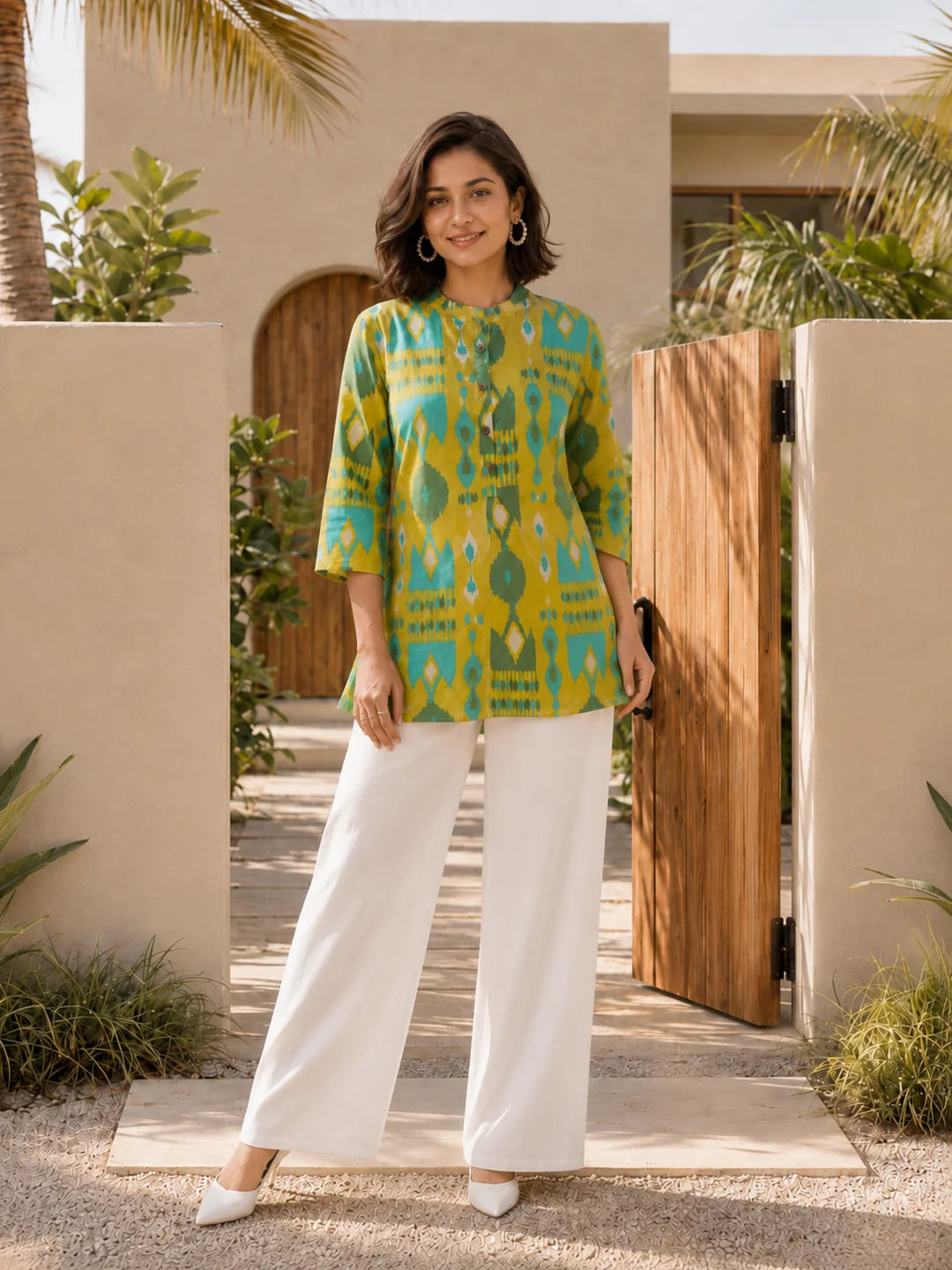Yellow and Turquoise Ikkat Print Short Kurti in Cotton