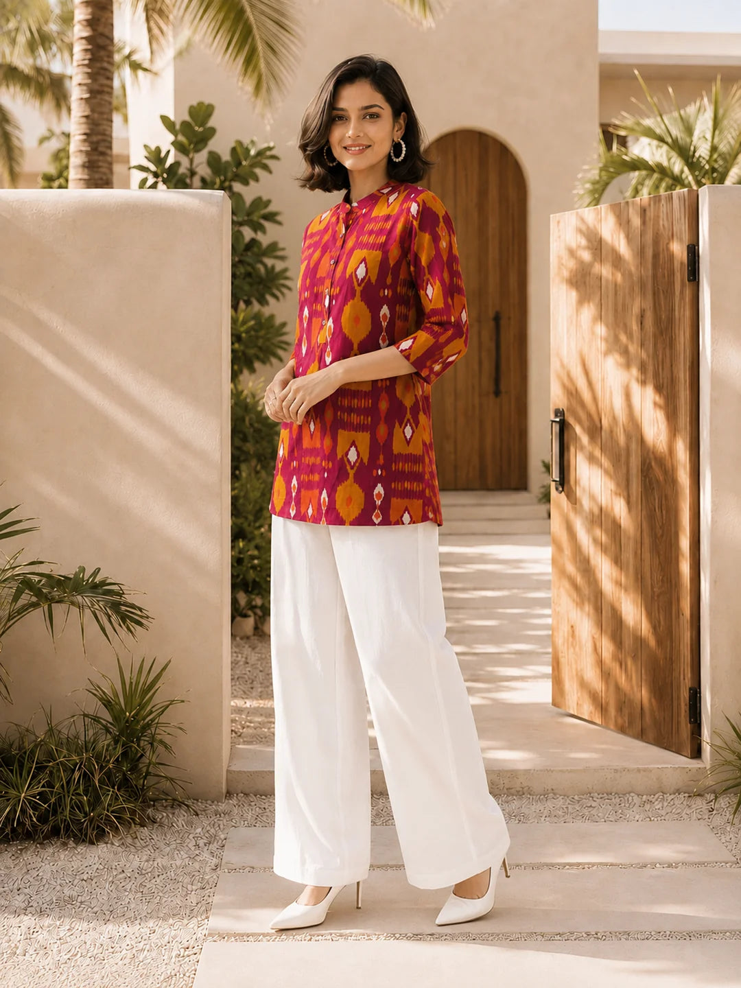 Pink and Orange Ikkat Print Short Kurti in Cotton