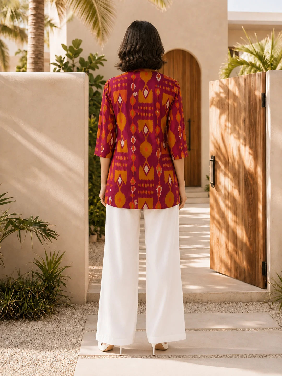 Pink and Orange Ikkat Print Short Kurti in Cotton