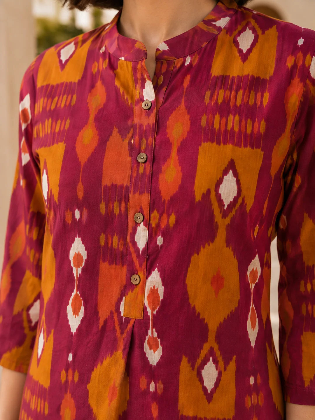 Pink and Orange Ikkat Print Short Kurti in Cotton