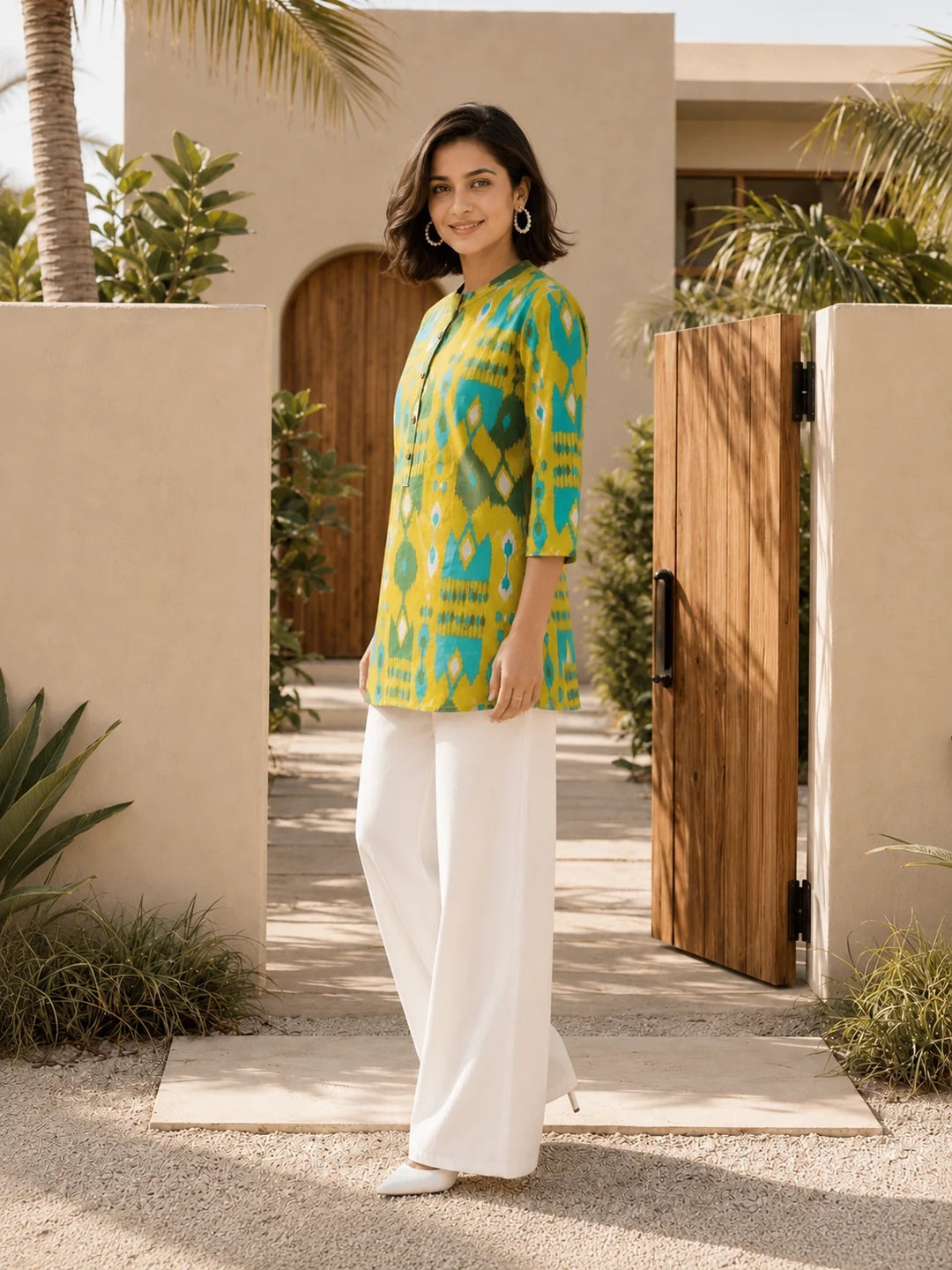 Yellow and Turquoise Ikkat Print Short Kurti in Cotton