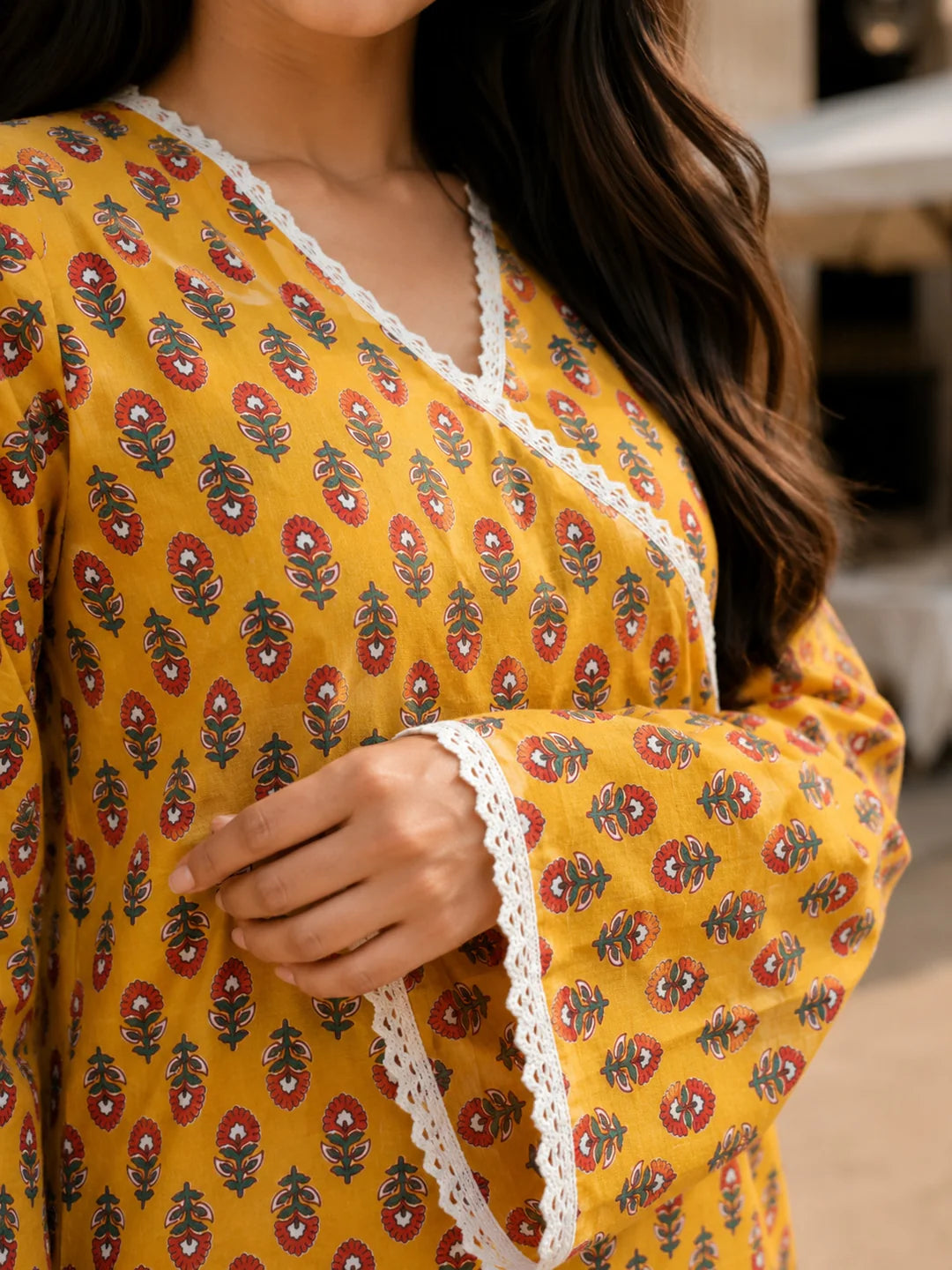Yellow Floral Buti Printed Angrakha Style Short Kurti in Cotton