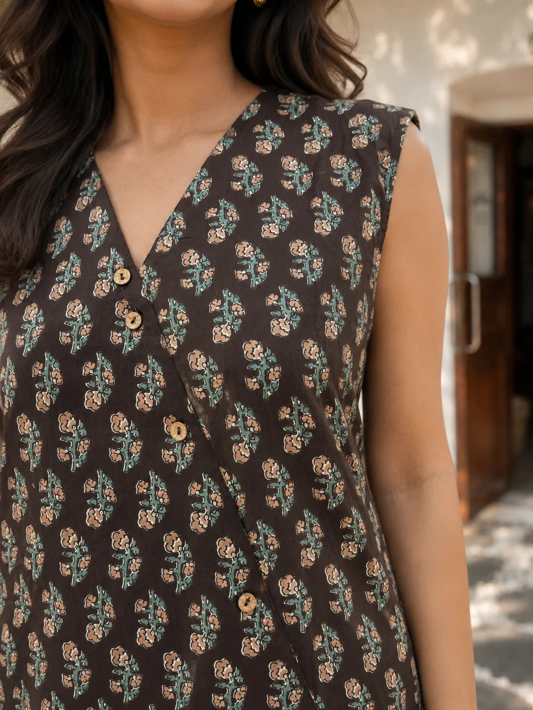 Brown Sleeveless Floral Buti Printed Short Kurti with Wooden Button in Cotton