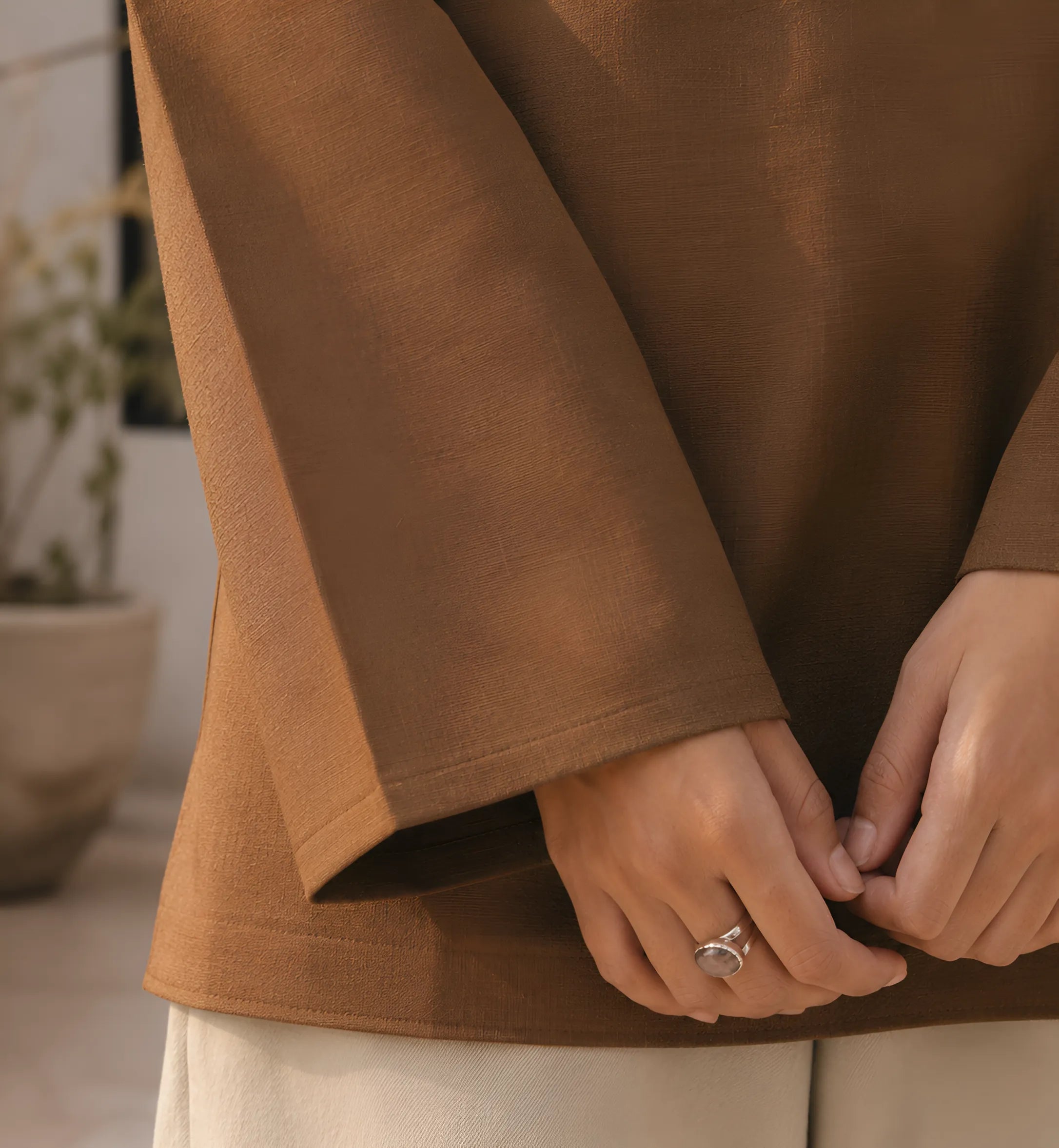 Brown Short Kurti with Wooden Button Detailing in Poly Cotton