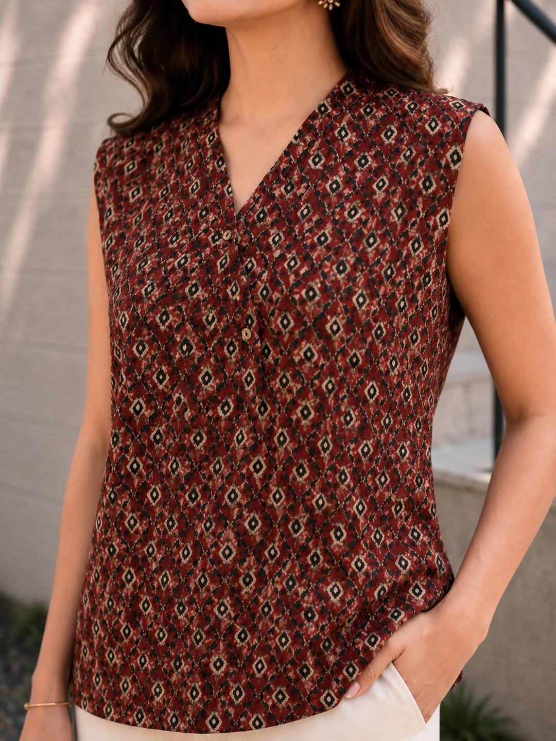 Brick Red Sleeveless Geometric Printed Short Kurti with Wooden Button in Cotton