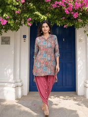 Jharokha Collage Printed High Low Shirt Style Muslin Tunic With Tulip Pants.