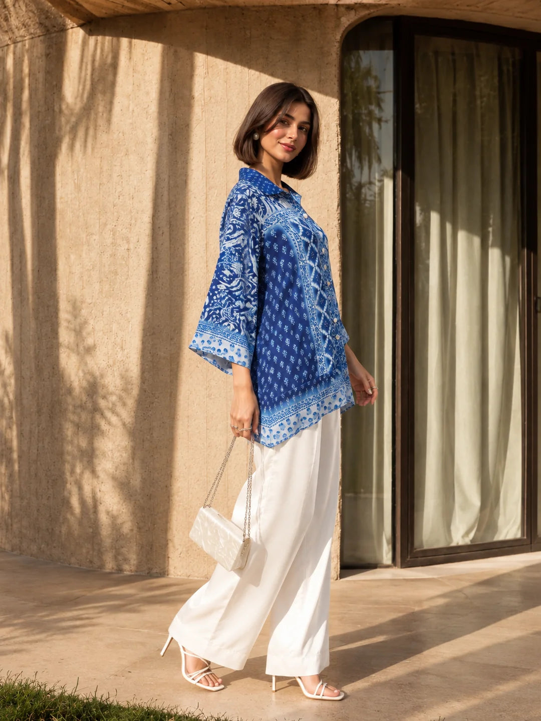 Blue V-Notch Shirt with Embellished Placket & Multiple Patch Print in Crepe