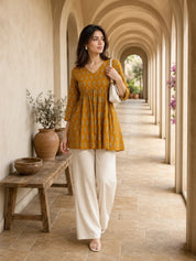Mustard Yellow Gathered Bust Floral Buta Flared A-Line Short Kurti in Cotton