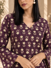 Túnica de muselina negra estampada con detalles de cenefa étnica