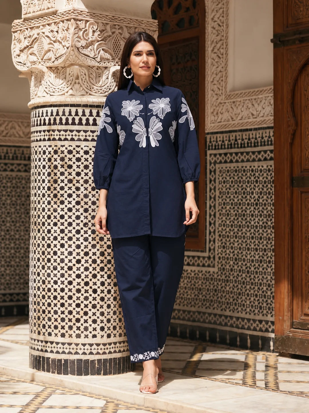EmbroideredNavyinaMoorishCourtyard_result.webp