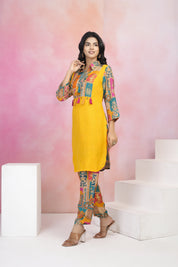 Yellow Muslin Co-Ord Set with Lurex Thread Work & Copper Coin Tassel Details