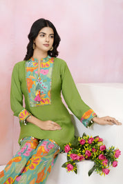 Parrot Green Muslin Co-Ord Set with Mirror Work & Tassel Details