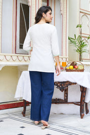 White Base Chikankari Short Kurti with Green Ethnic Embroidery in Cotton