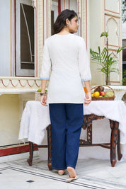 White Base Chikankari Short Kurti with Blue Ethnic Embroidery in Cotton