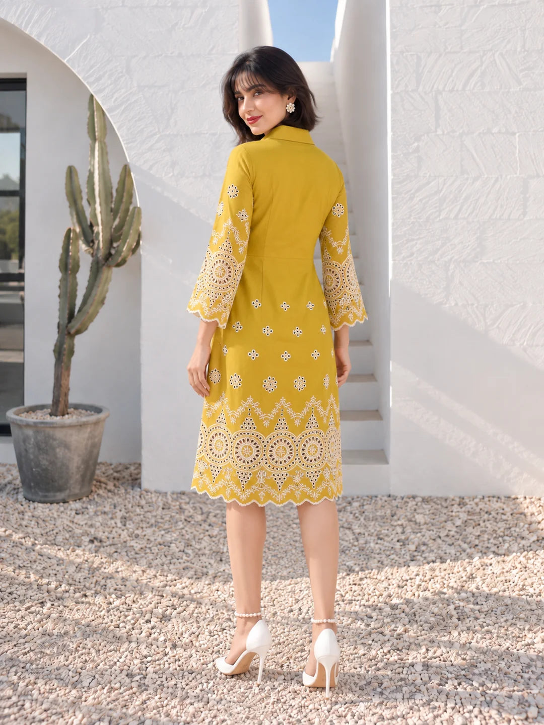 MustardEmbroideredDressinMediterraneanCourtyard_1__result.webp