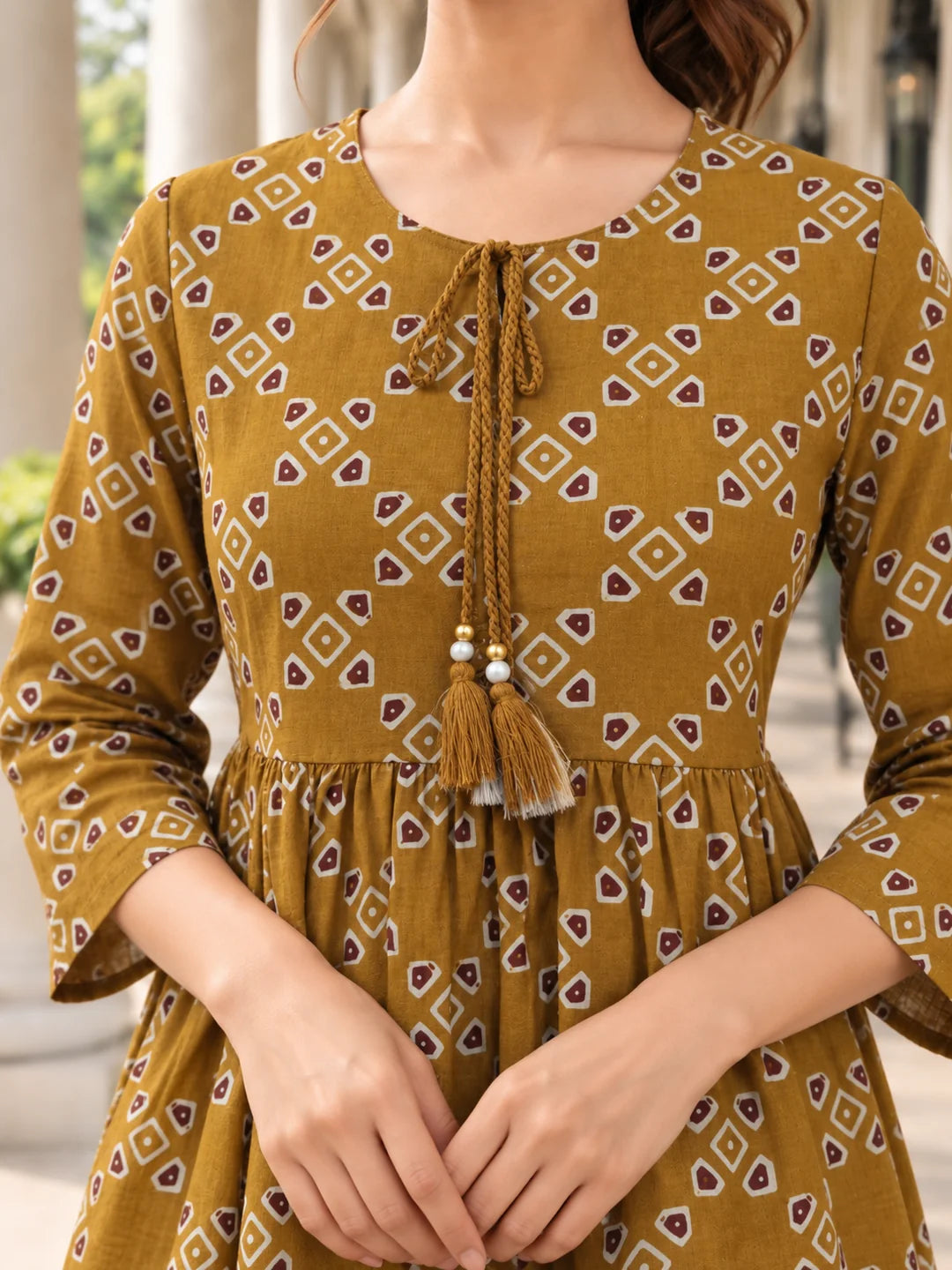 Mustard Yellow Tie-Neck Geometric Peplum Short Kurti in Cotton