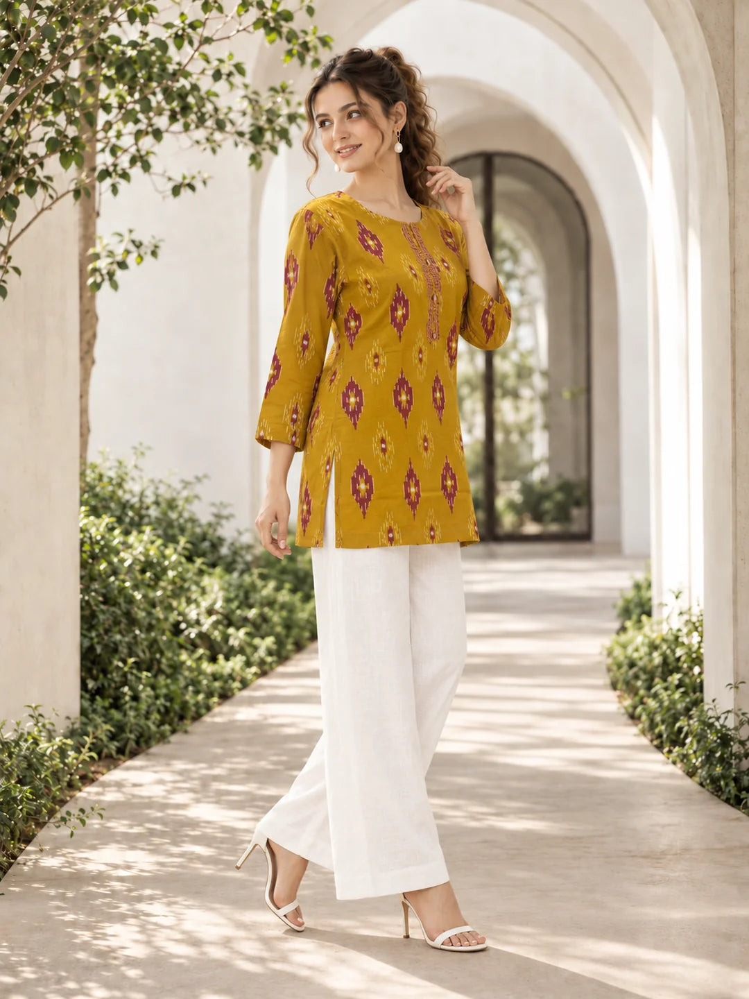 Yellow & Red Ikkat Print Short Kurti in Cotton