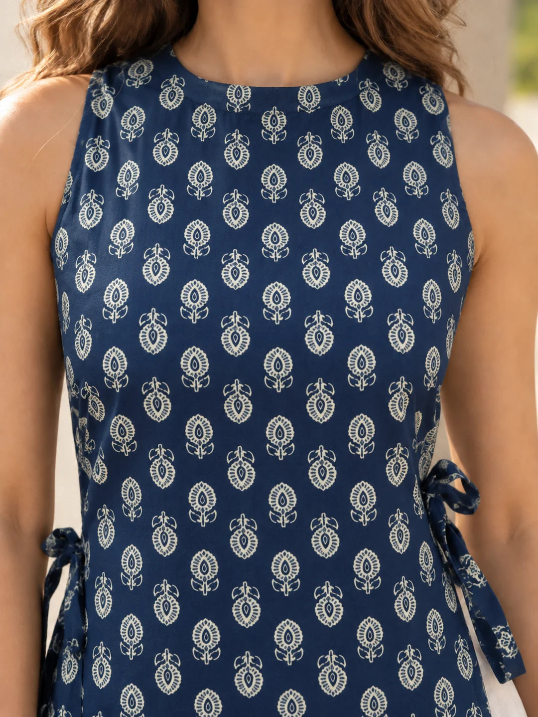 Navy Blue Floral Buti Sleeveless High-Low Short Kurti in Cotton