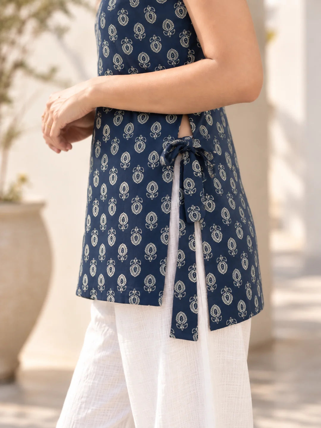 Navy Blue Floral Buti Sleeveless High-Low Short Kurti in Cotton