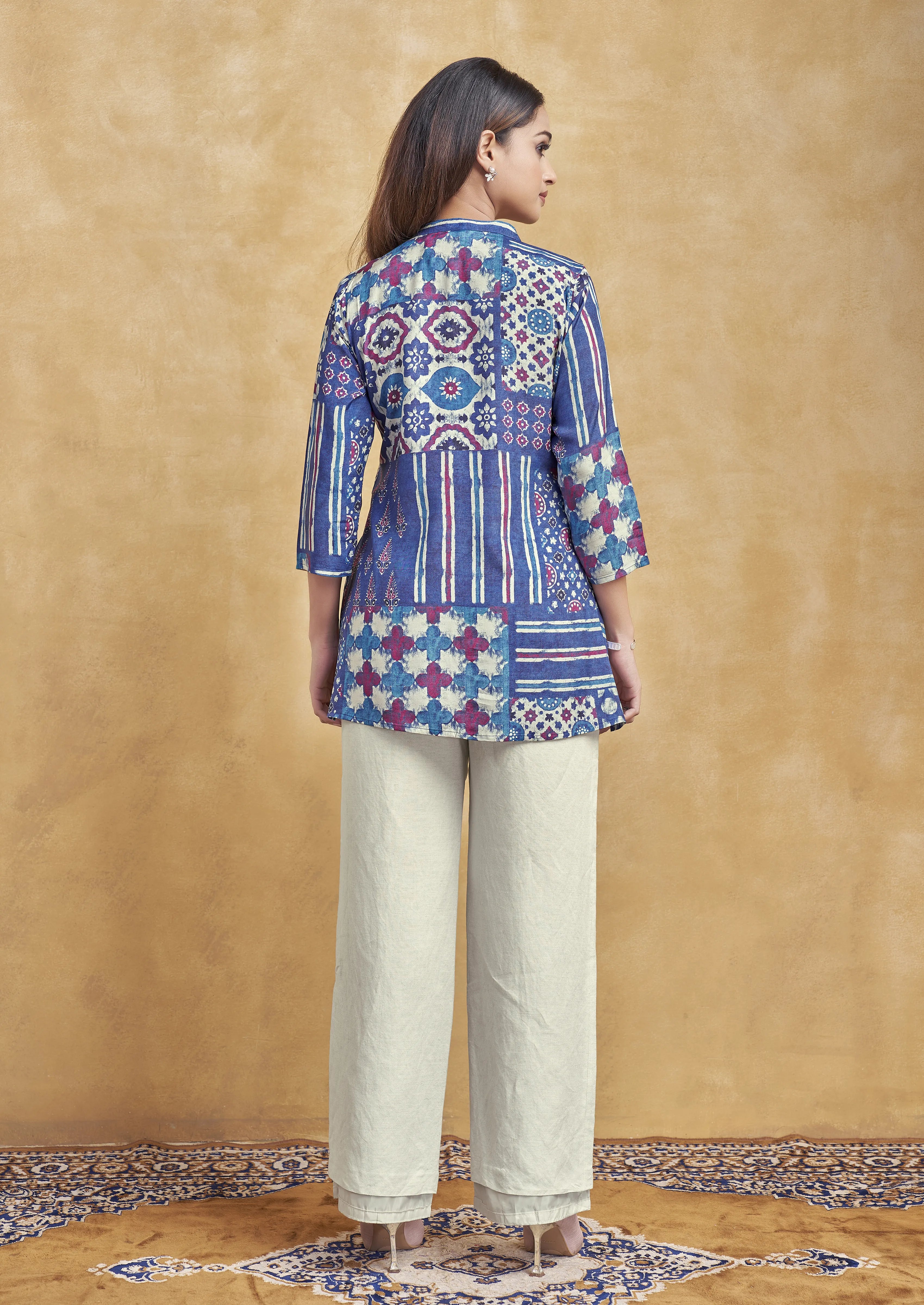 Blue Base Multicolor Printed Short Kurti in Muslin