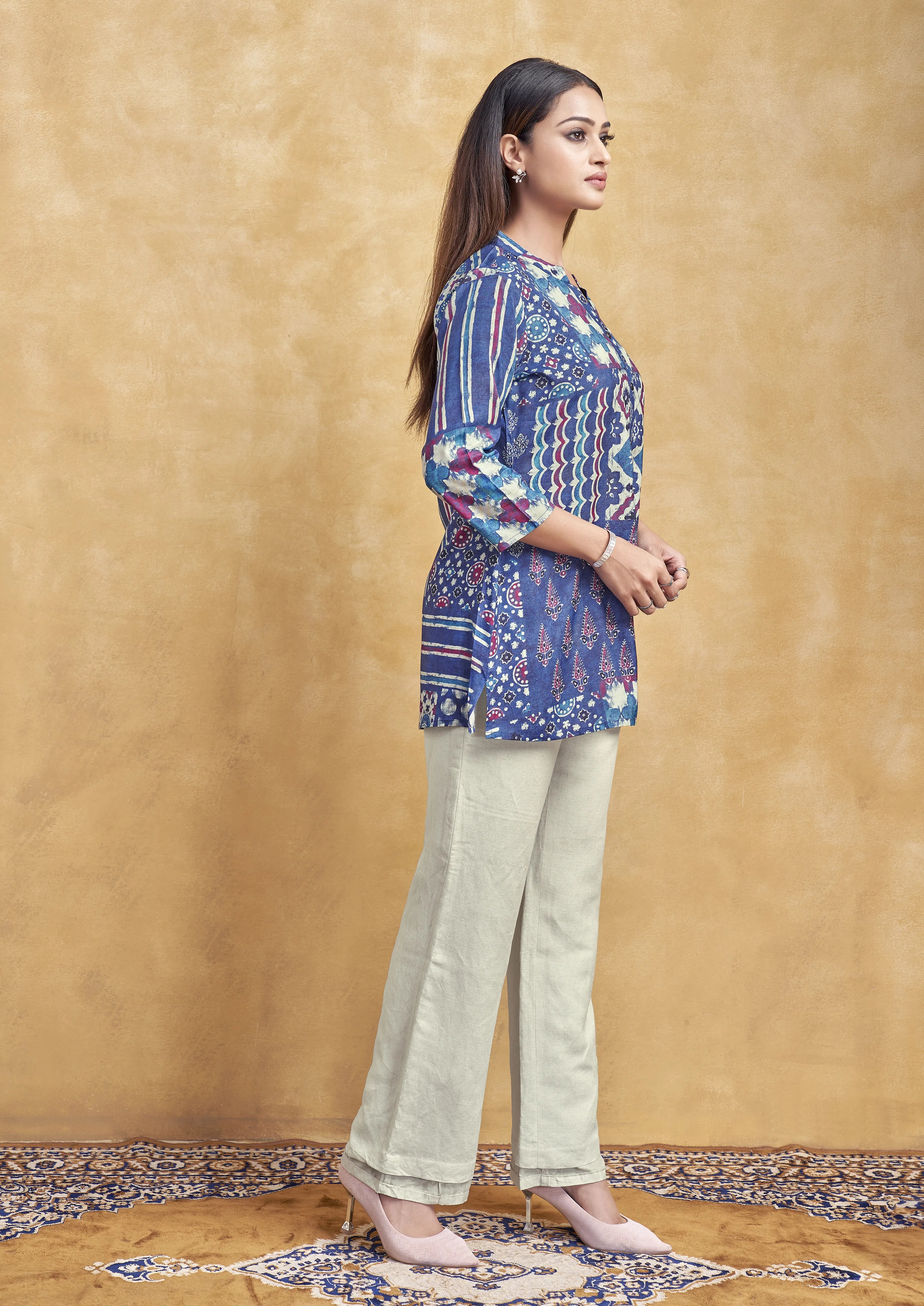 Blue Base Multicolor Printed Short Kurti in Muslin