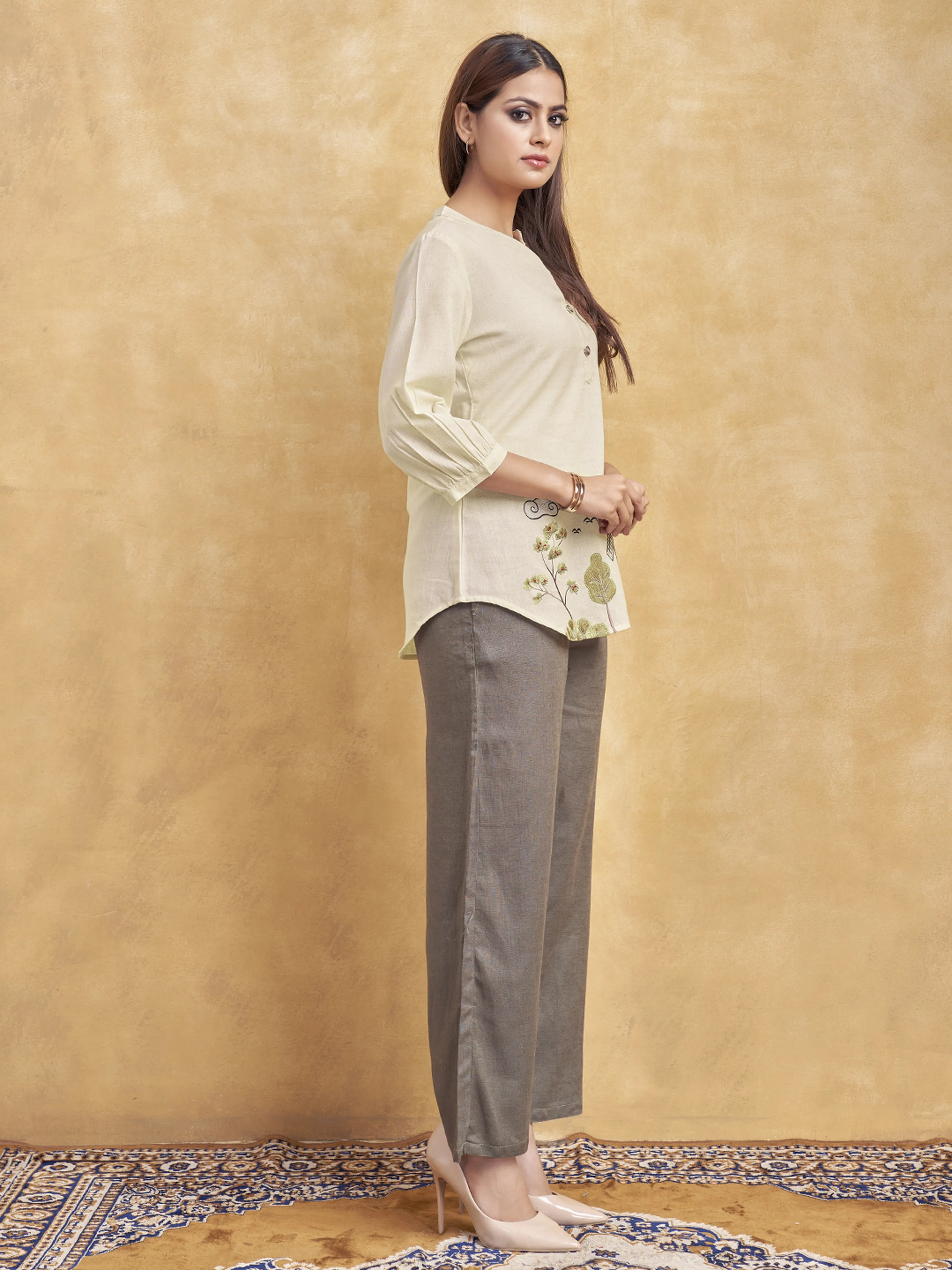 Beige Windmill Scenic Embroidered Short Kurti in Cotton Flex