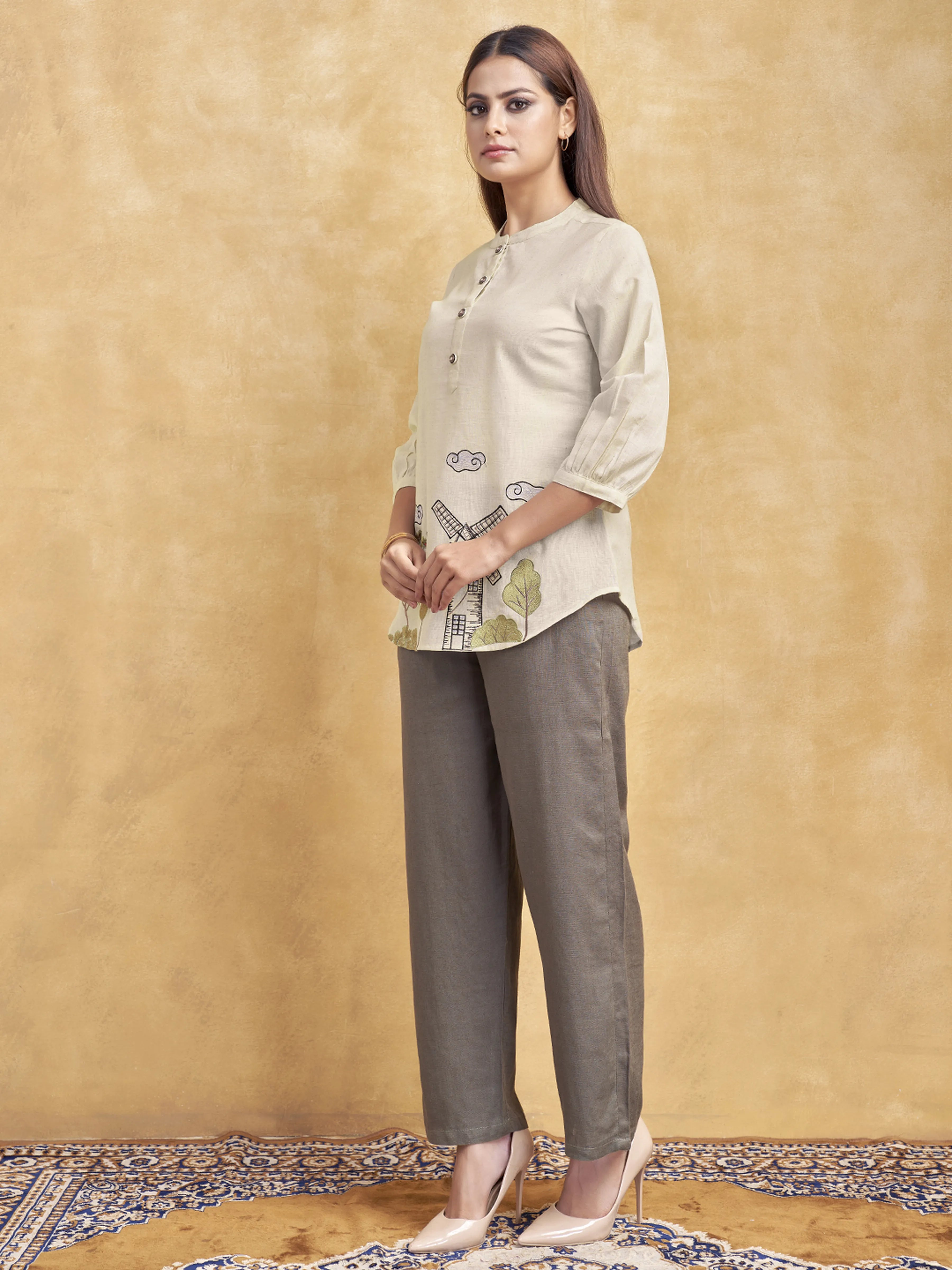 Beige Windmill Scenic Embroidered Short Kurti in Cotton Flex