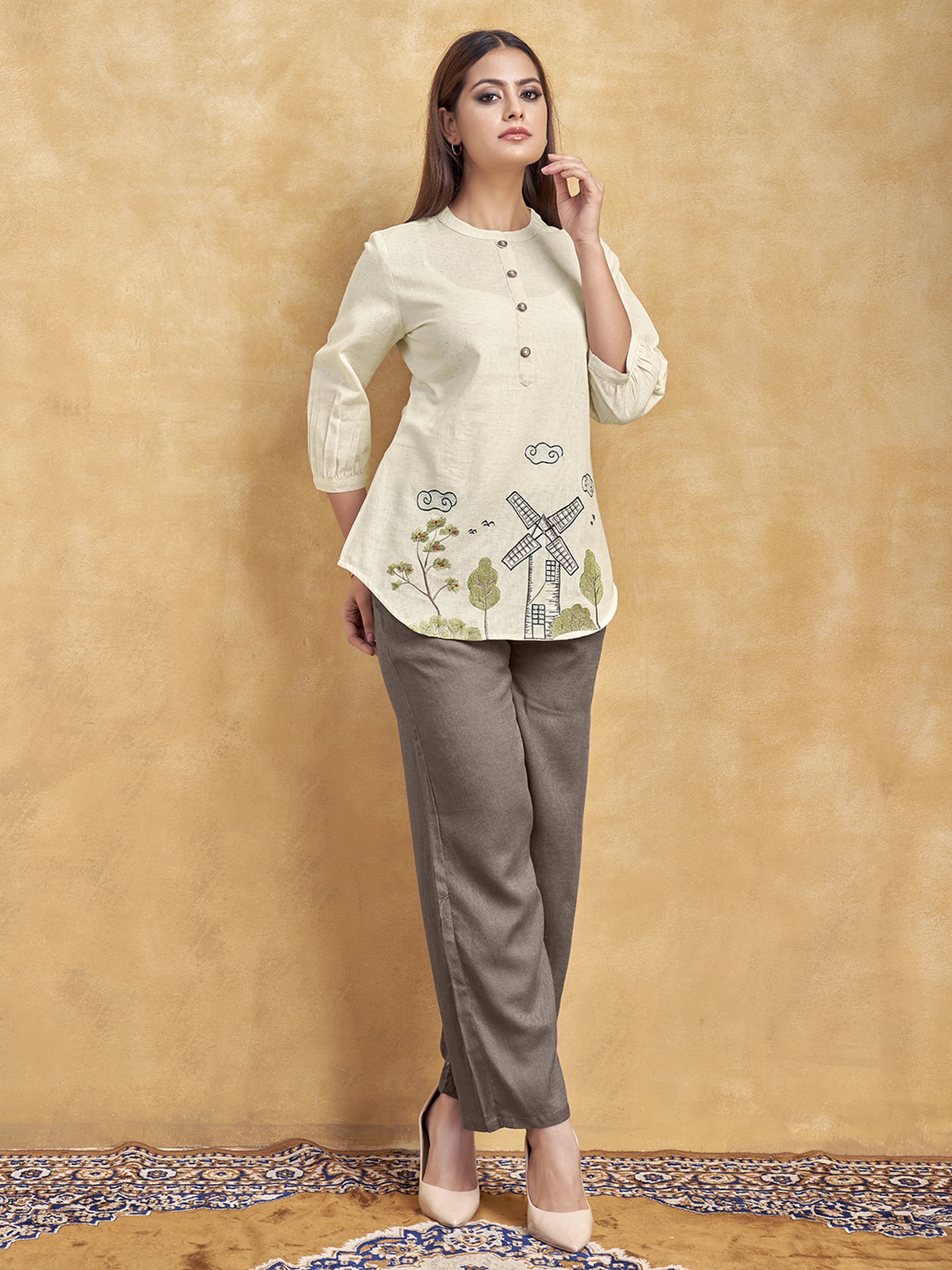 Beige Windmill Scenic Embroidered Short Kurti in Cotton Flex