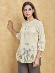 Beige Windmill Scenic Embroidered Short Kurti in Cotton Flex