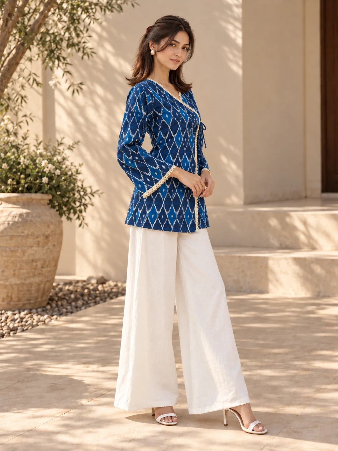 Blue Ikkat Print Angrakha Style Short Kurti in Cotton