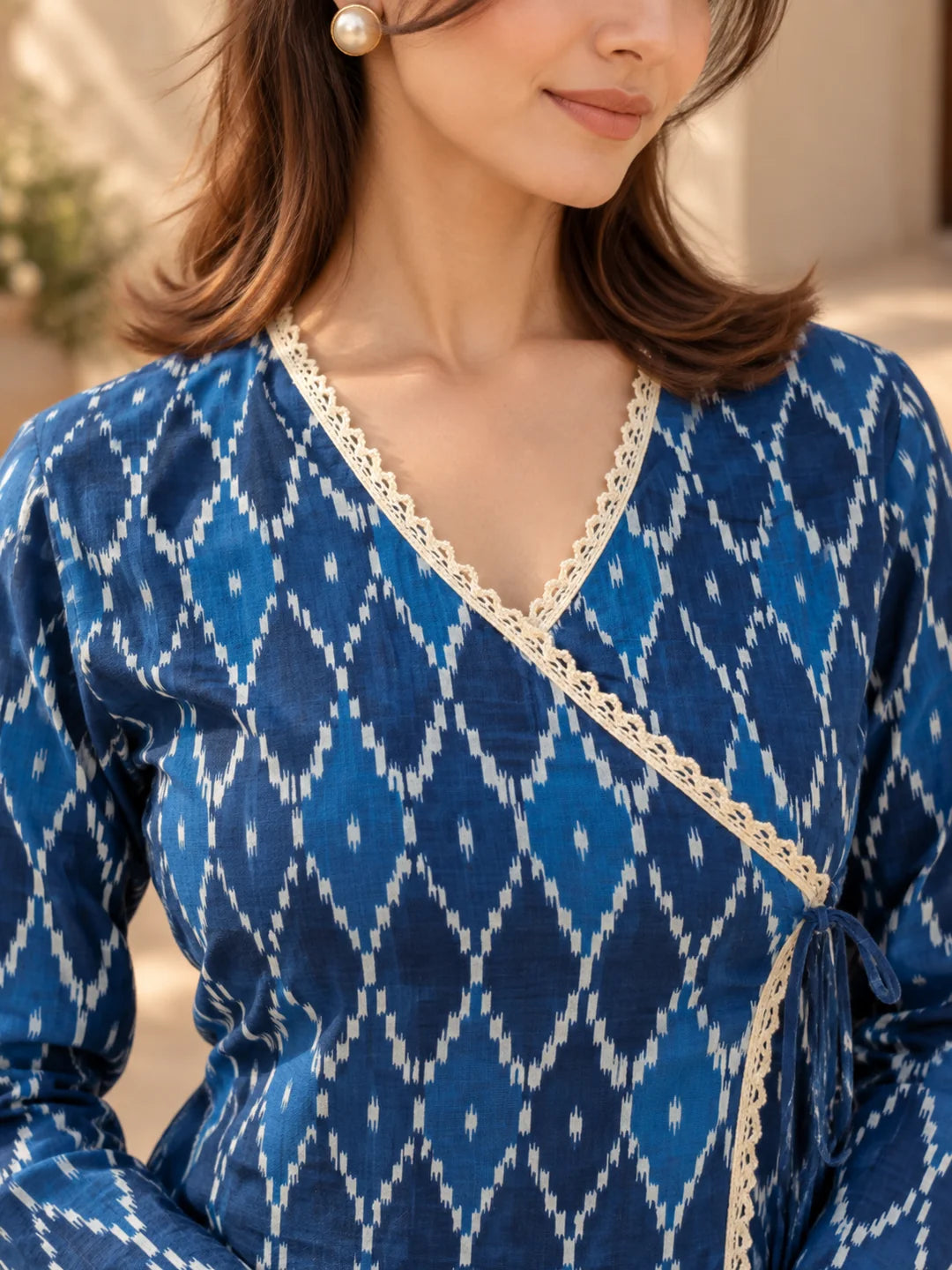 Blue Ikkat Print Angrakha Style Short Kurti in Cotton