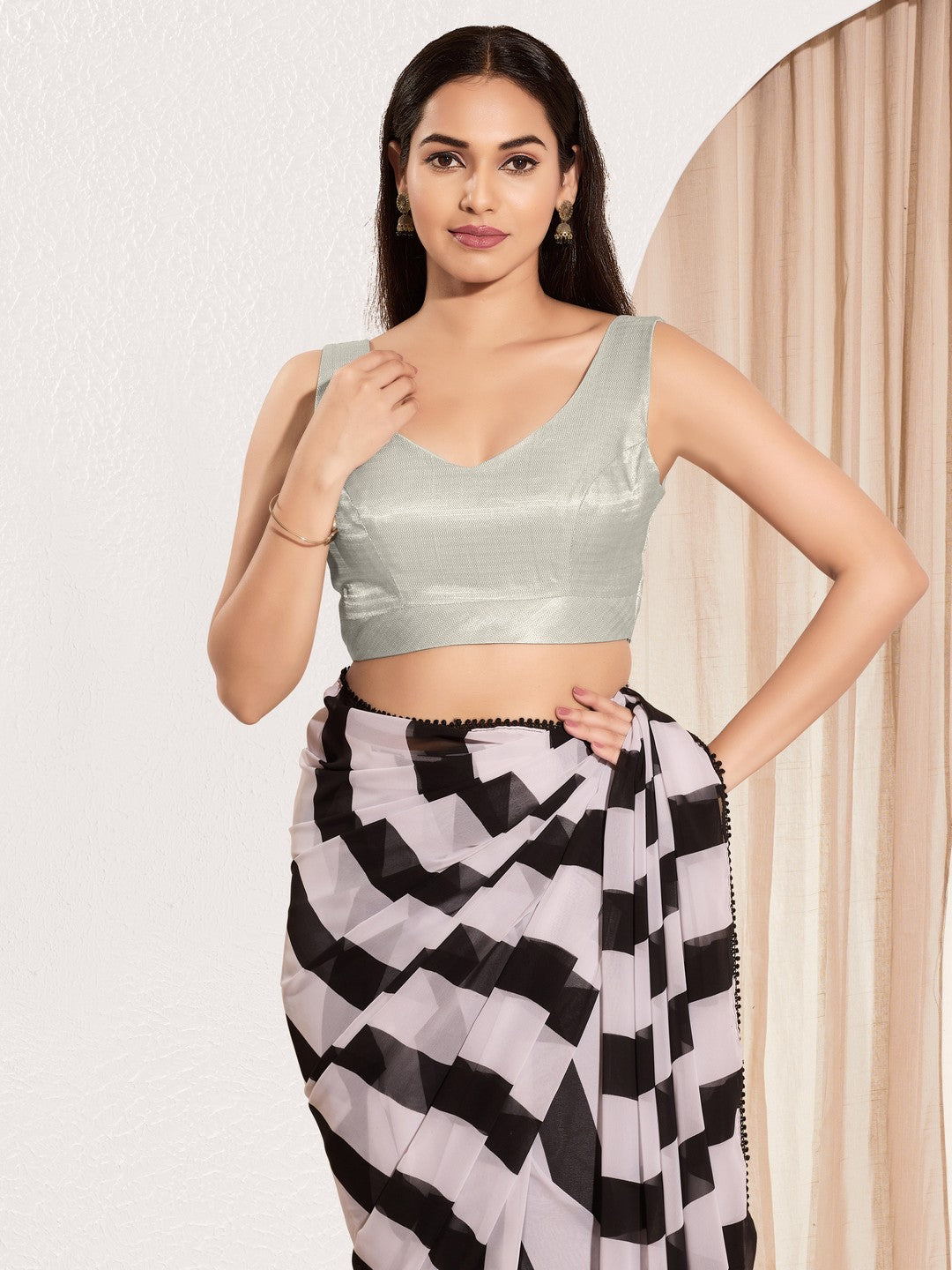 Vamas Shimmer V Neck Yoke Solid Sleeveless Blouse