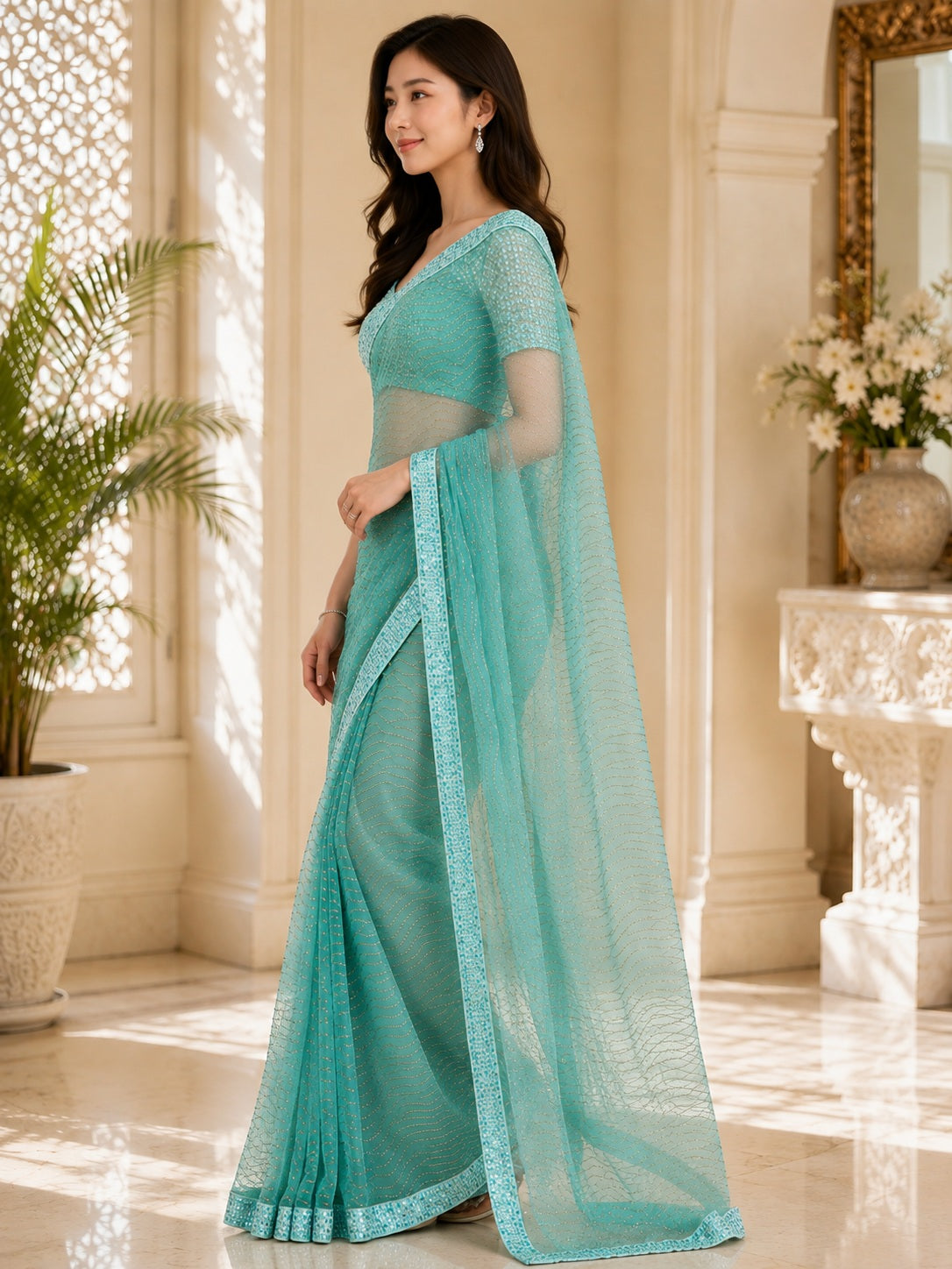 Vervee Couture Women Sea Green Wavy Embellished Poly Net Saree