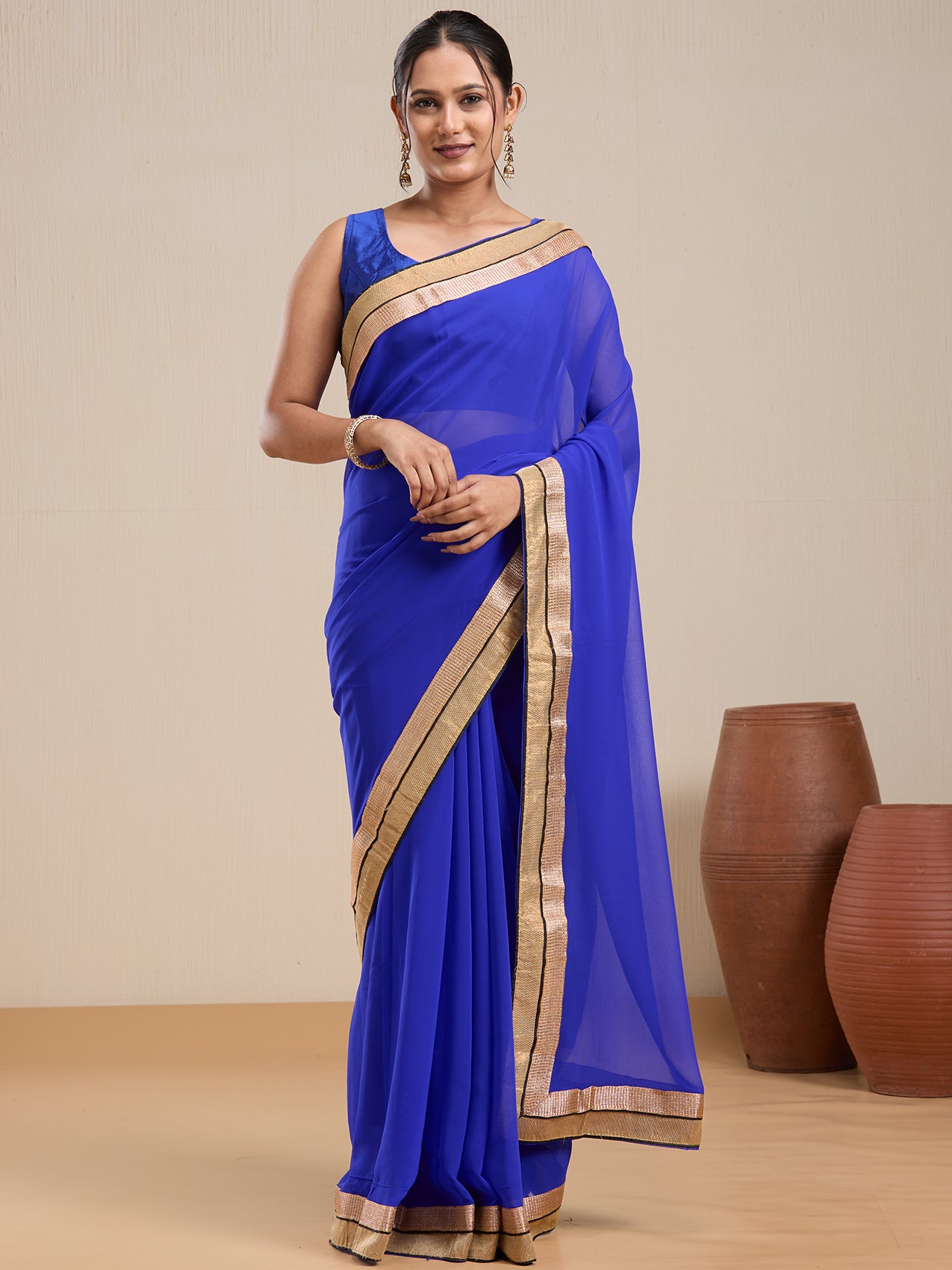 Vervee Couture Blue Poly Georgette Saree with Zari Border and Semi Stitched Blouse | EKA
