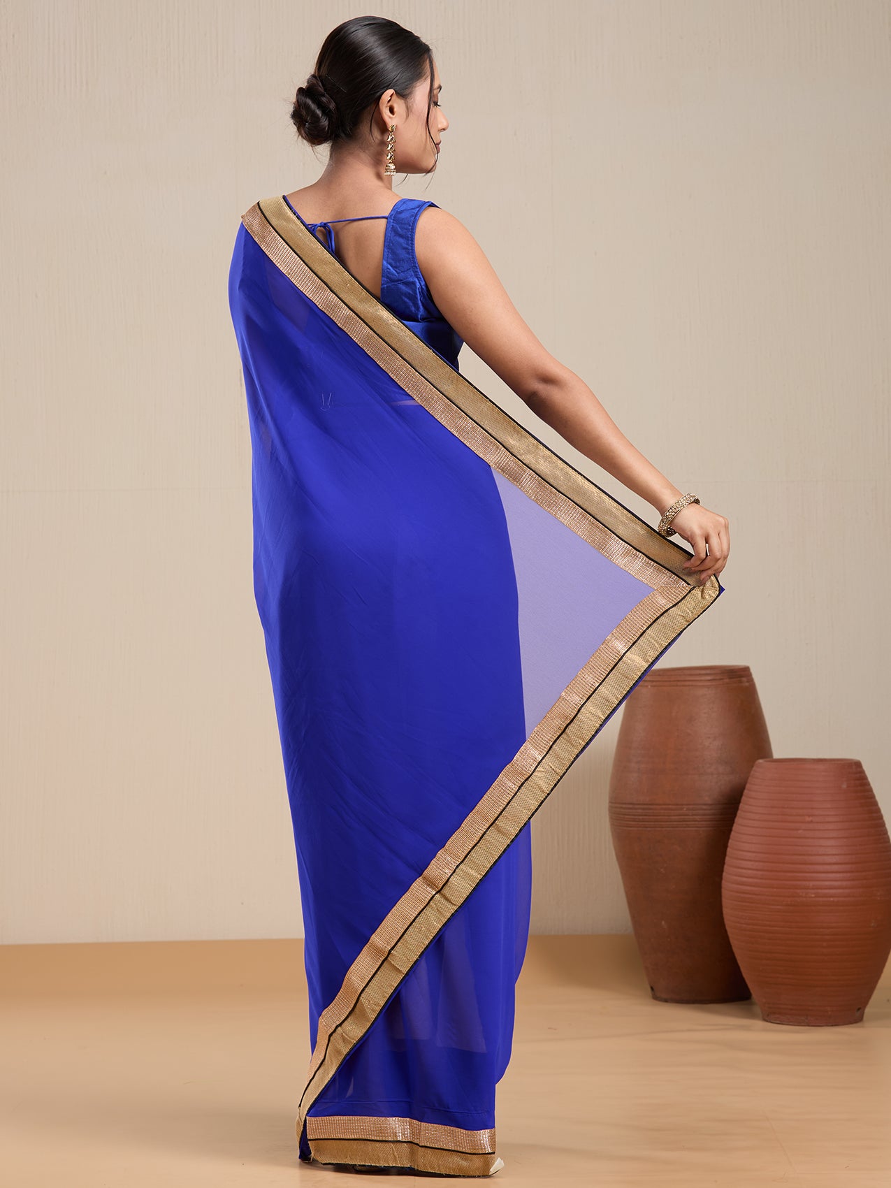 Vervee Couture Blue Poly Georgette Saree with Zari Border and Semi Stitched Blouse | EKA