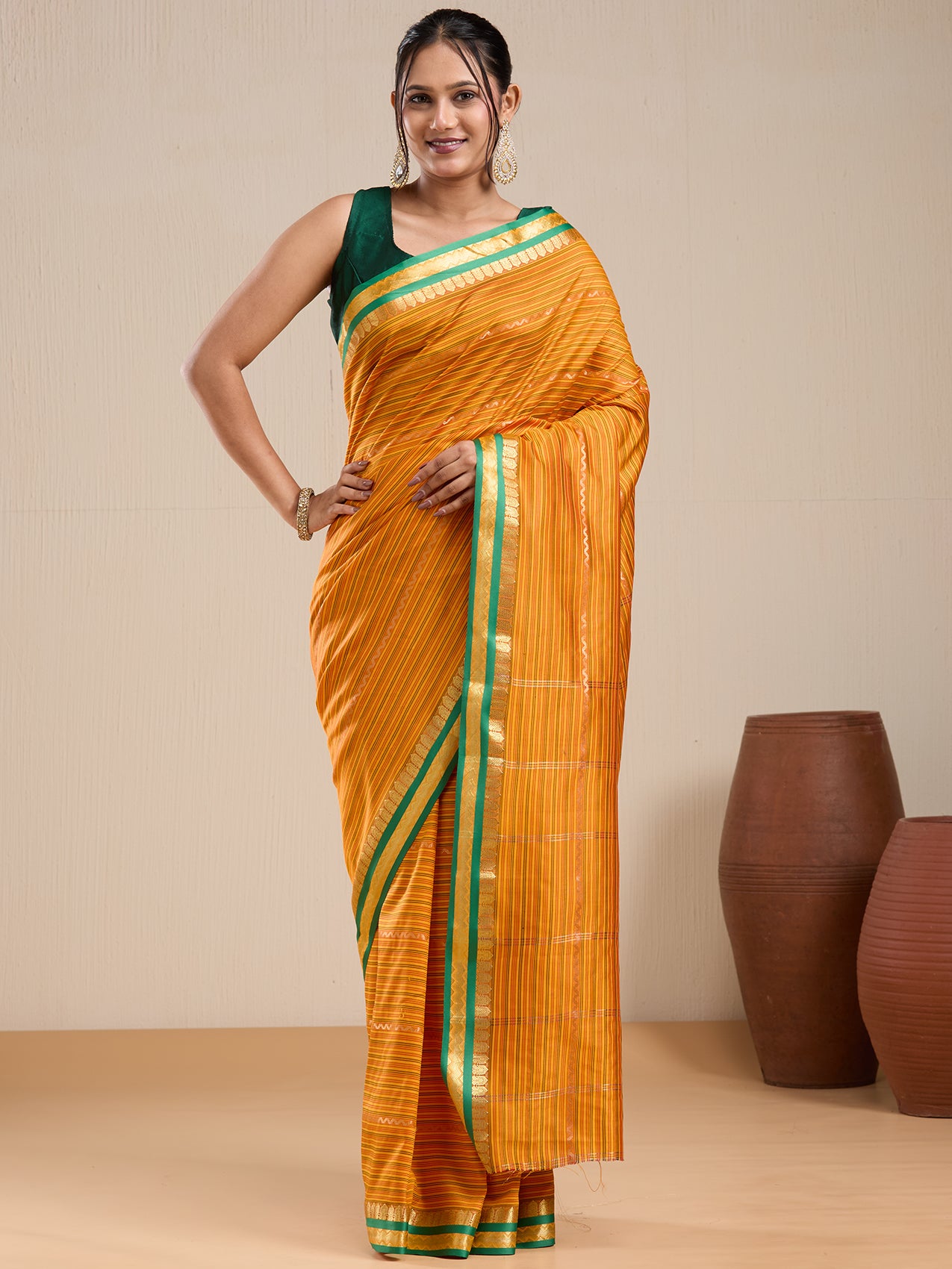 Vervee Couture Orange Striped Silk Blend Saree with Contrast Border | EKA