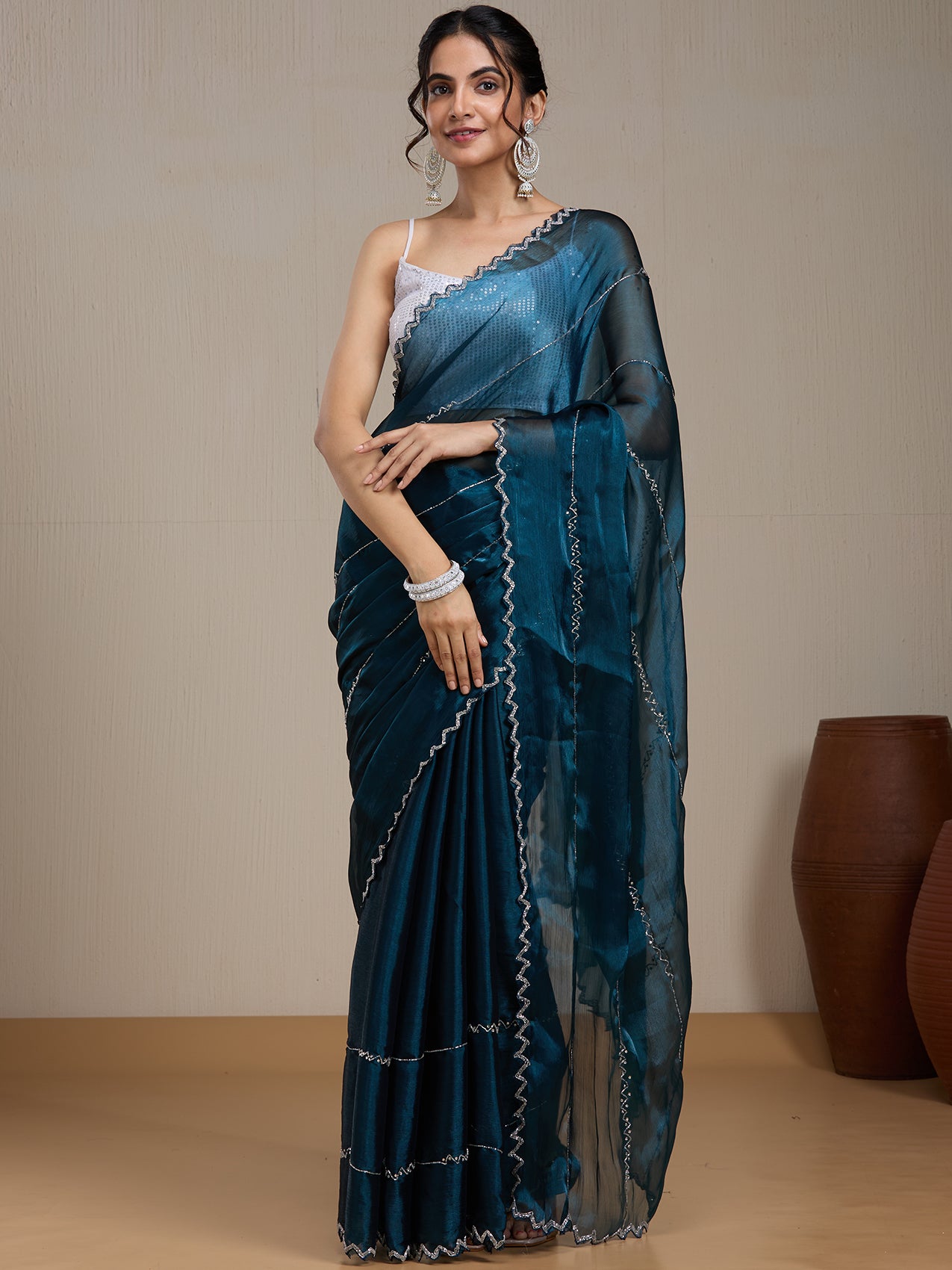 Vervee Couture Blue Poly Georgette Saree with Embellished Border and Semi Stitched Blouse | EKA