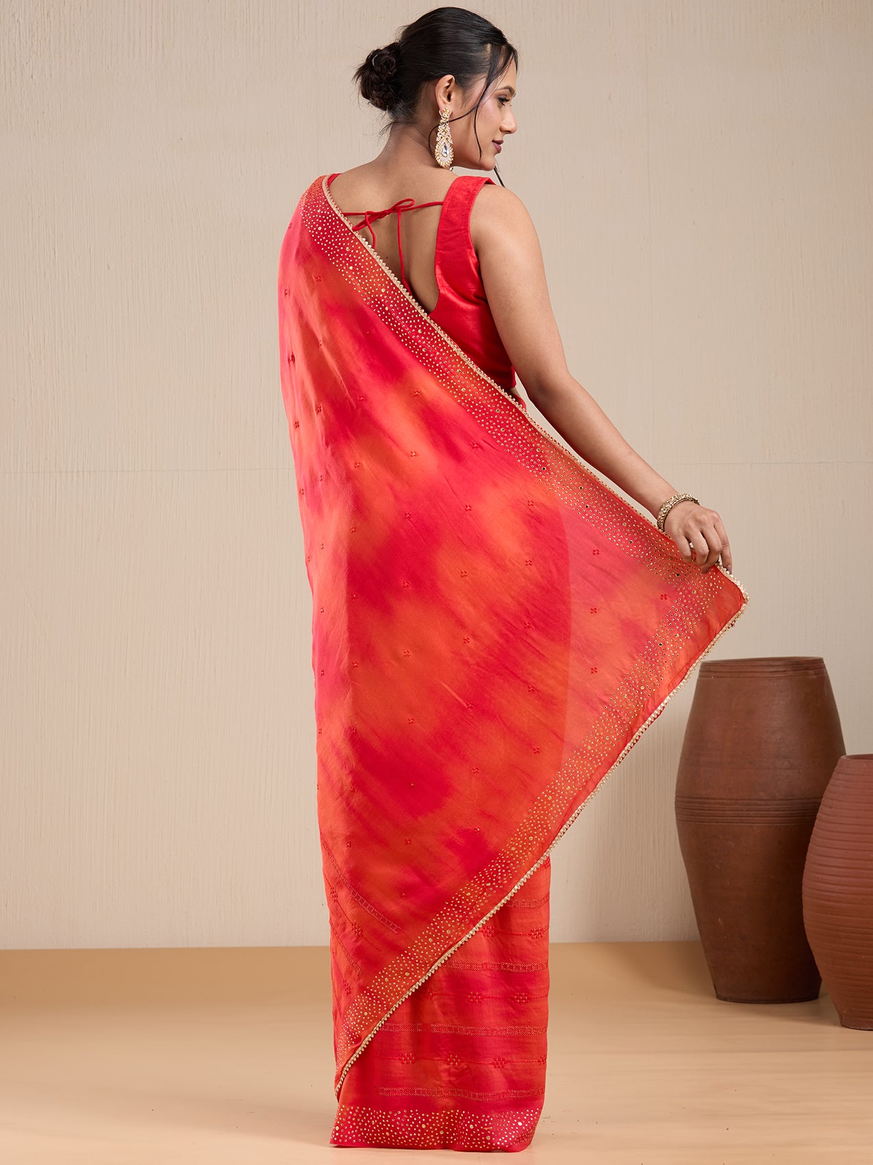 Vervee Couture Orange Poly Georgette Saree with Sequinned Border and Semi Stitched Blouse | EKA