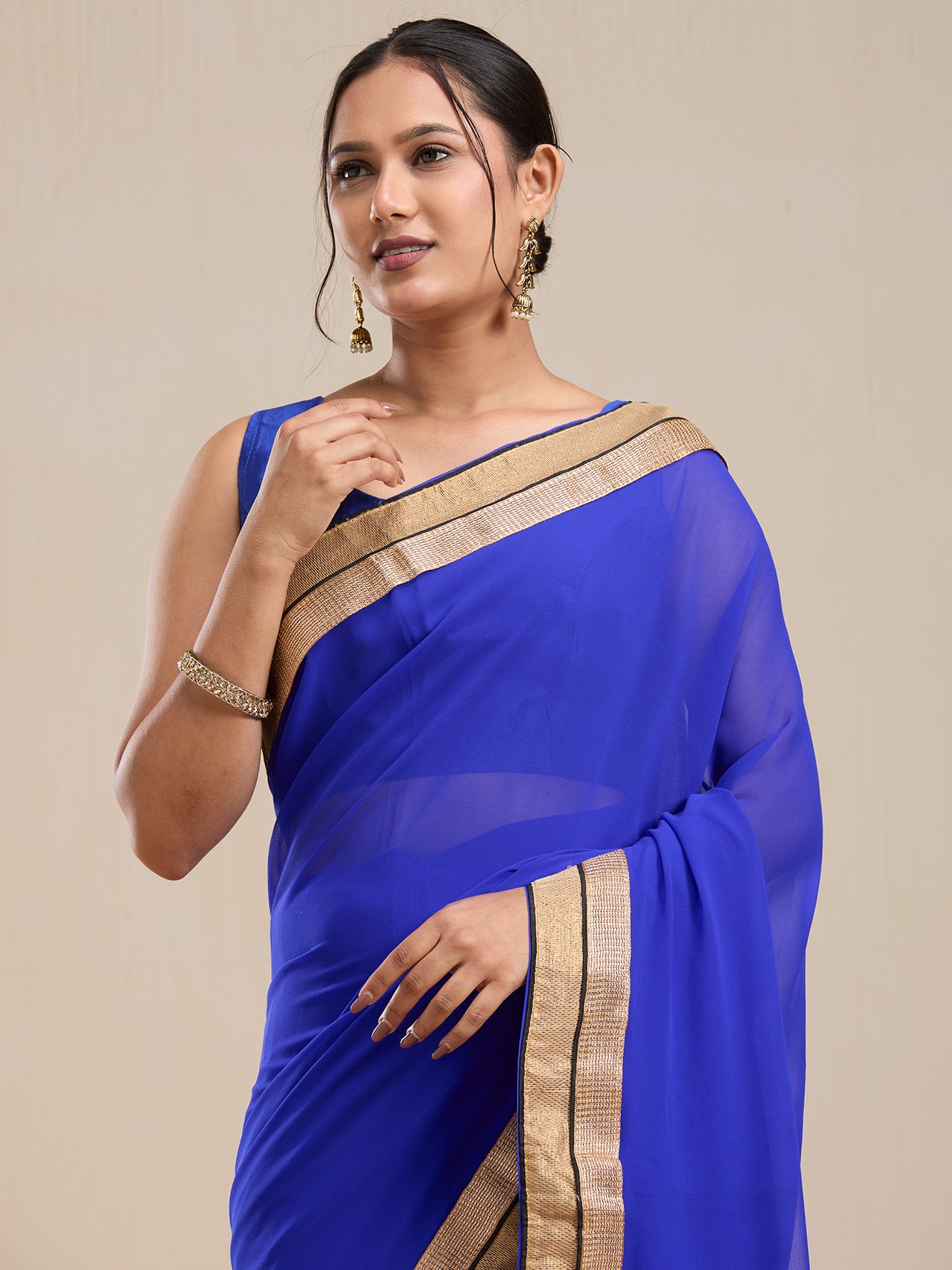Vervee Couture Blue Poly Georgette Saree with Zari Border and Semi Stitched Blouse | EKA