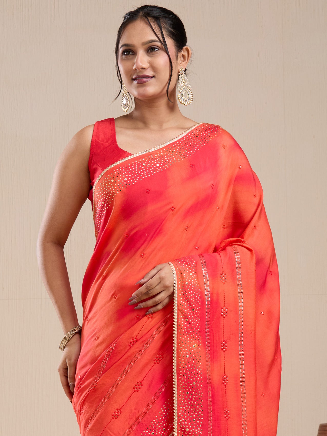 Vervee Couture Orange Poly Georgette Saree with Sequinned Border and Semi Stitched Blouse | EKA