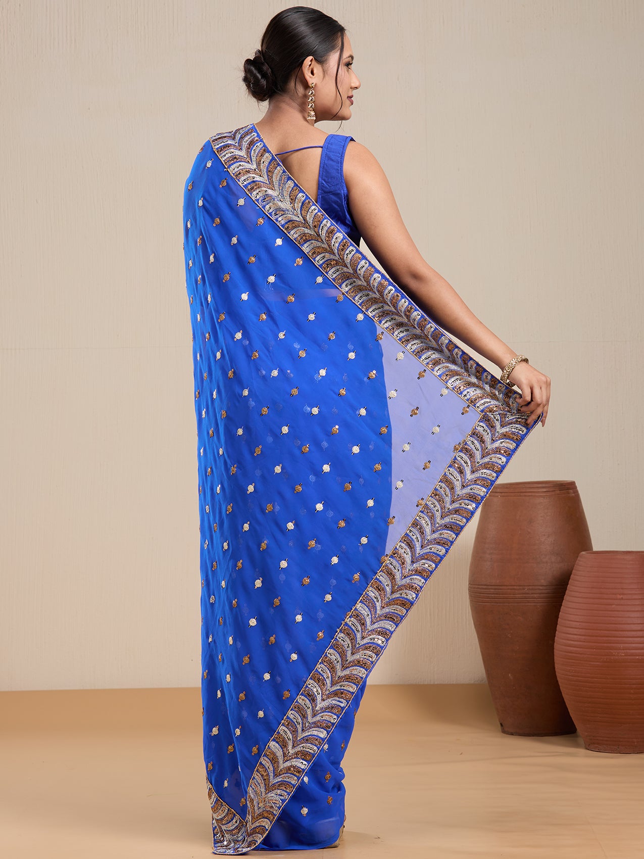 Vervee Couture Blue Poly Georgette Saree with Embellished Border and Semi Stitched Blouse | EKA