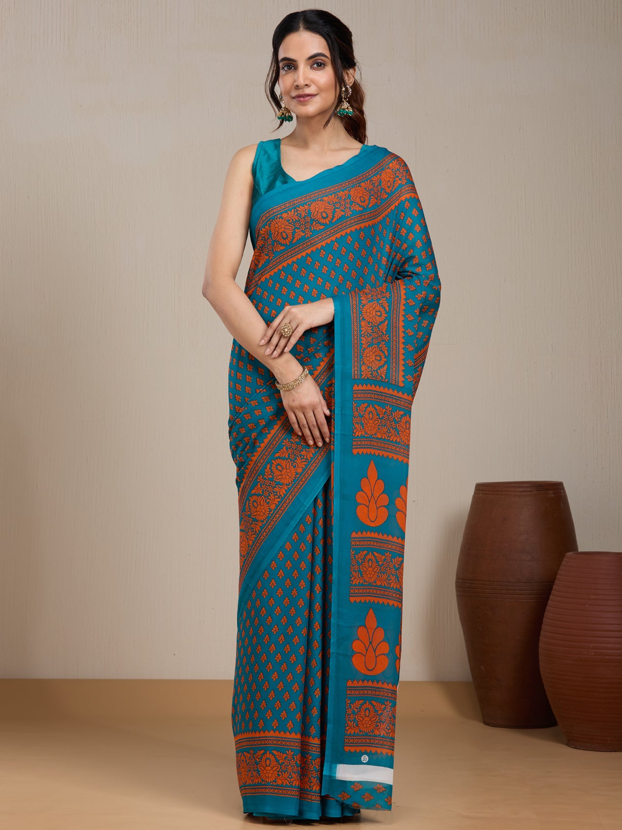 Vervee Couture Teal Printed Poly Georgette Saree with Contrast Border | EKA