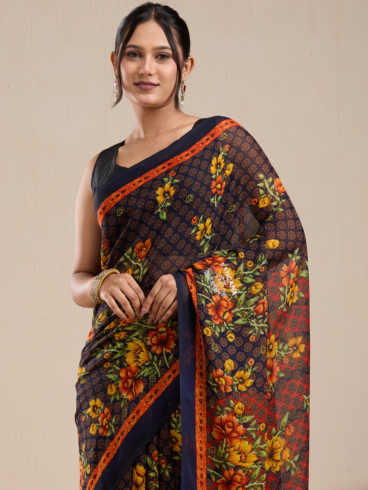 Vervee Couture Black Floral Poly Georgette Saree with Contrast Border and Semi Stitched Blouse | EKA