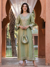 Pastel Green Mirror Work Kurta Set with Potli Bag in Tissue