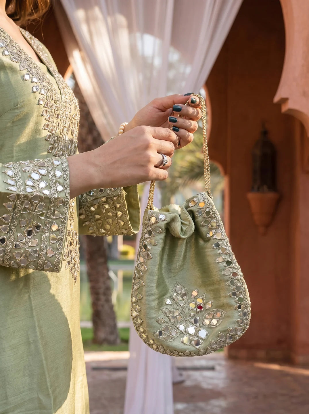 Pastel Green Mirror Work Kurta Set with Potli Bag in Tissue
